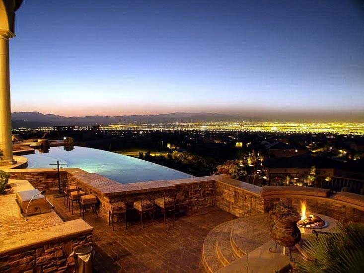 Vanishing edge over the valley at dusk — EverClear Pools, the Las Vegas Valley