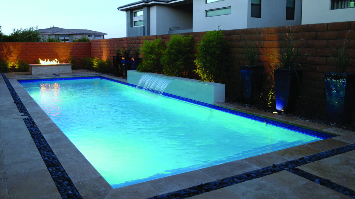 Sheer descent and fire on the raised wall — EverClear Pools, the Las Vegas Valley